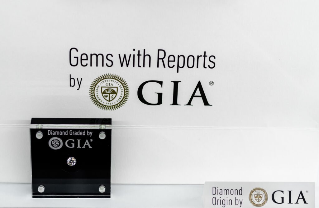 GRA Moissanite Report with a limited lifetime warranty card, providing certification of authenticity for a moissanite gemstone.